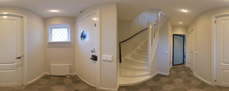Entrance hall with white staircase and hexagonal floor tiles – Verdilaan 14, Hilversum