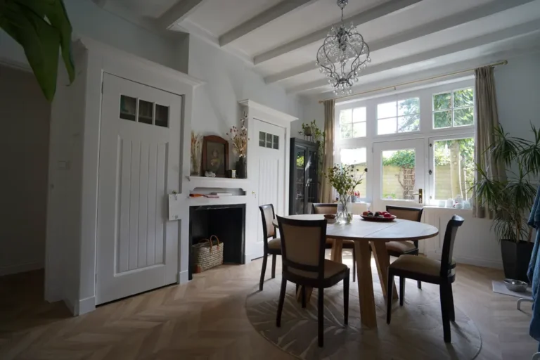 Renovated dining room with a bay window and classic detailing