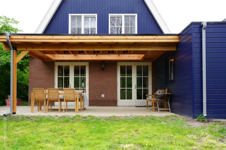 Renovated rear facade with a covered veranda and garden extension
