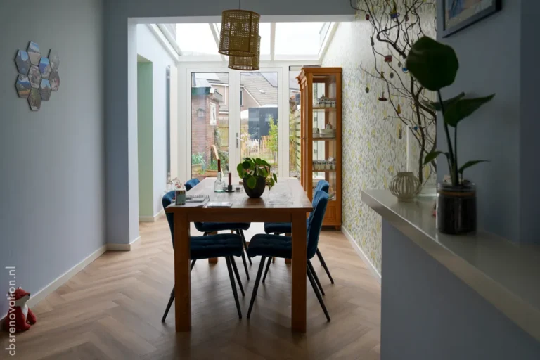 Dining room with a glass-roof extension and garden view