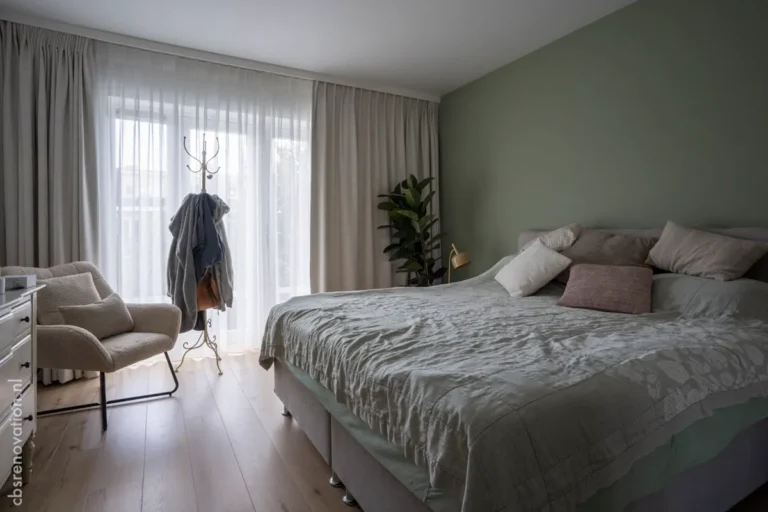 Bedroom with a double bed and patio doors to the garden