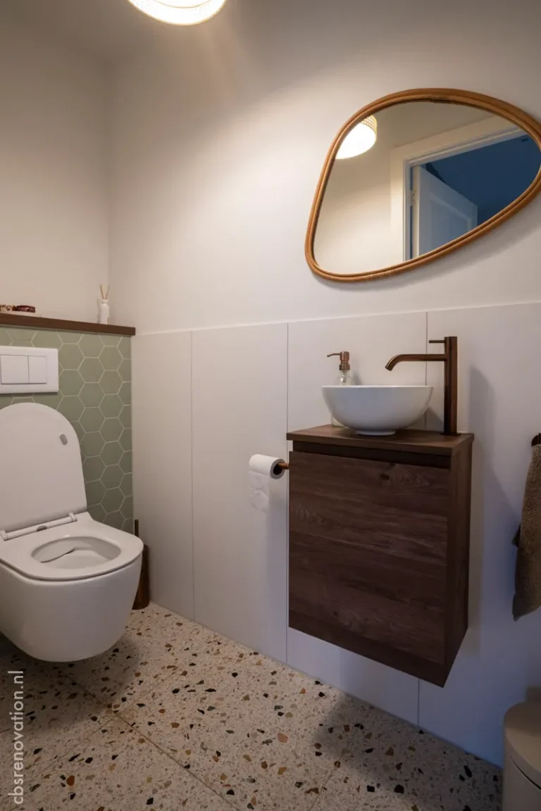 Toilet with a wooden vanity, vessel sink and terrazzo floor