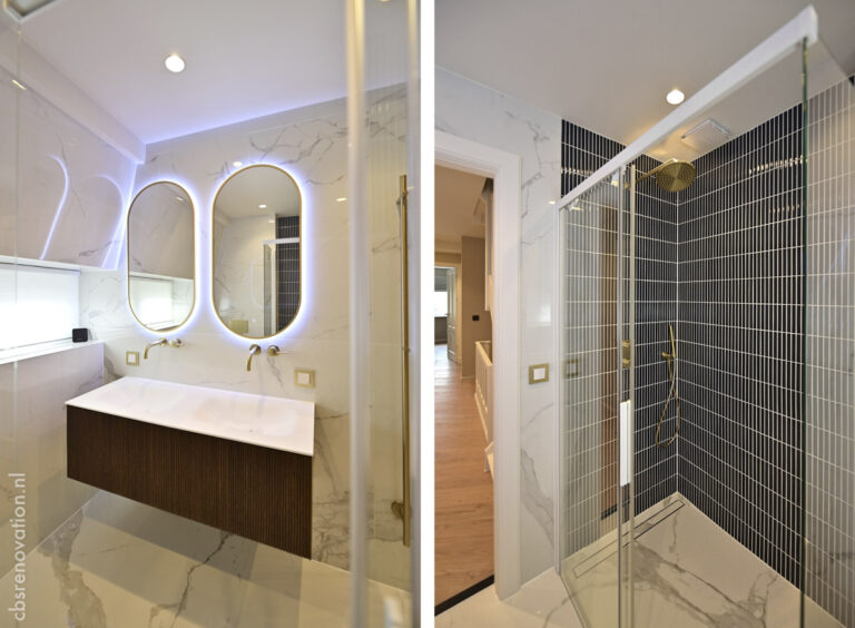 Renovated bathroom with twin backlit mirrors, a dark wood vanity and marble-look tiling