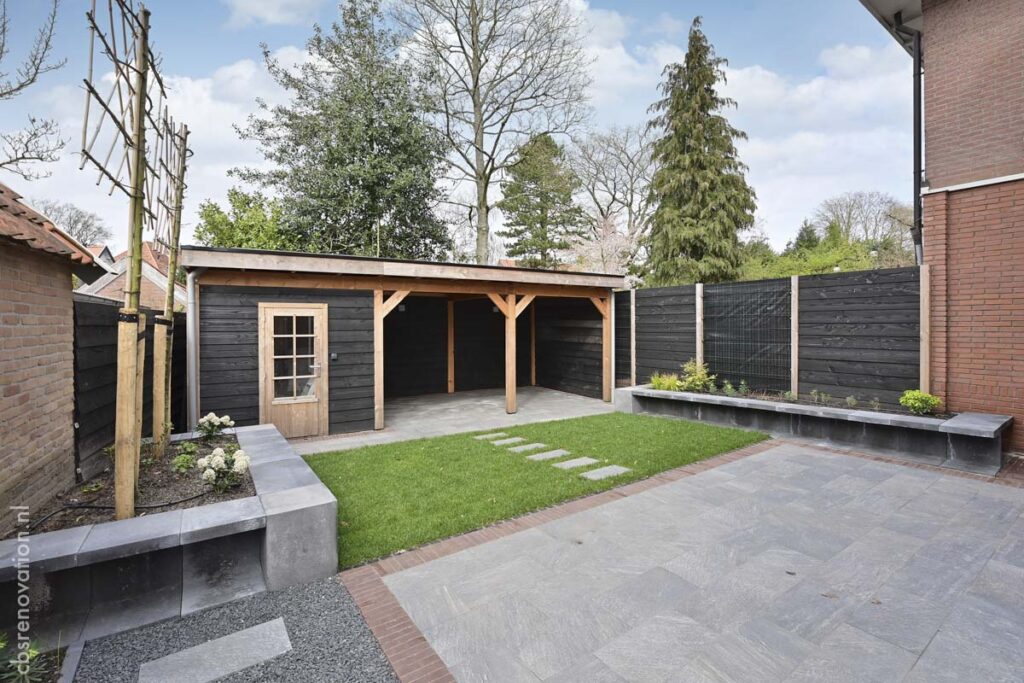 Garden shed and raised planters seen from the terrace