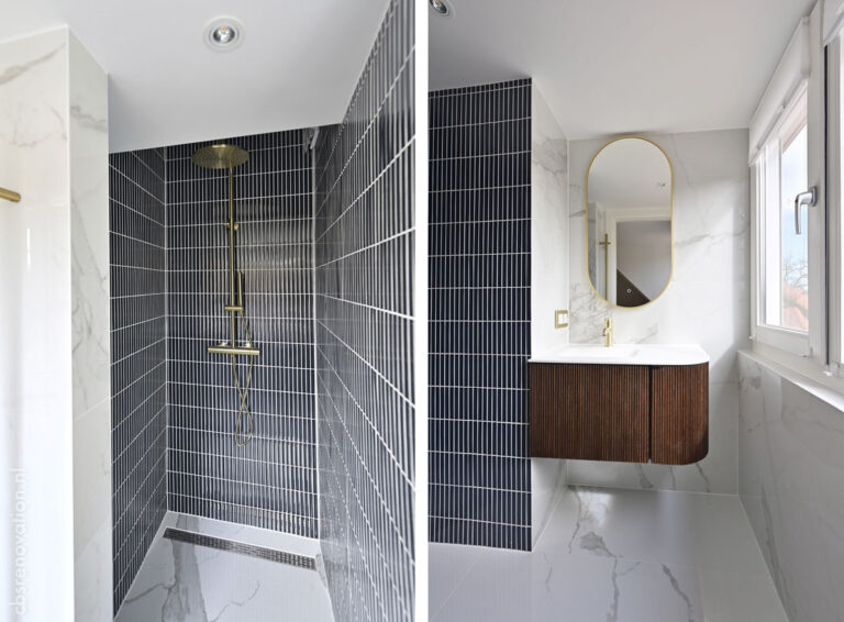 Walk-in shower finished in navy vertical tiles with a brass rain shower