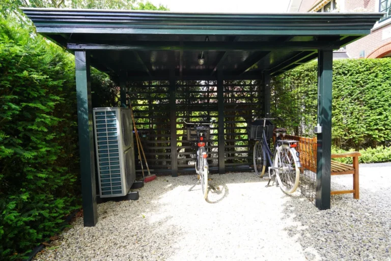 Heat pump units and bicycle parking under the carport roof